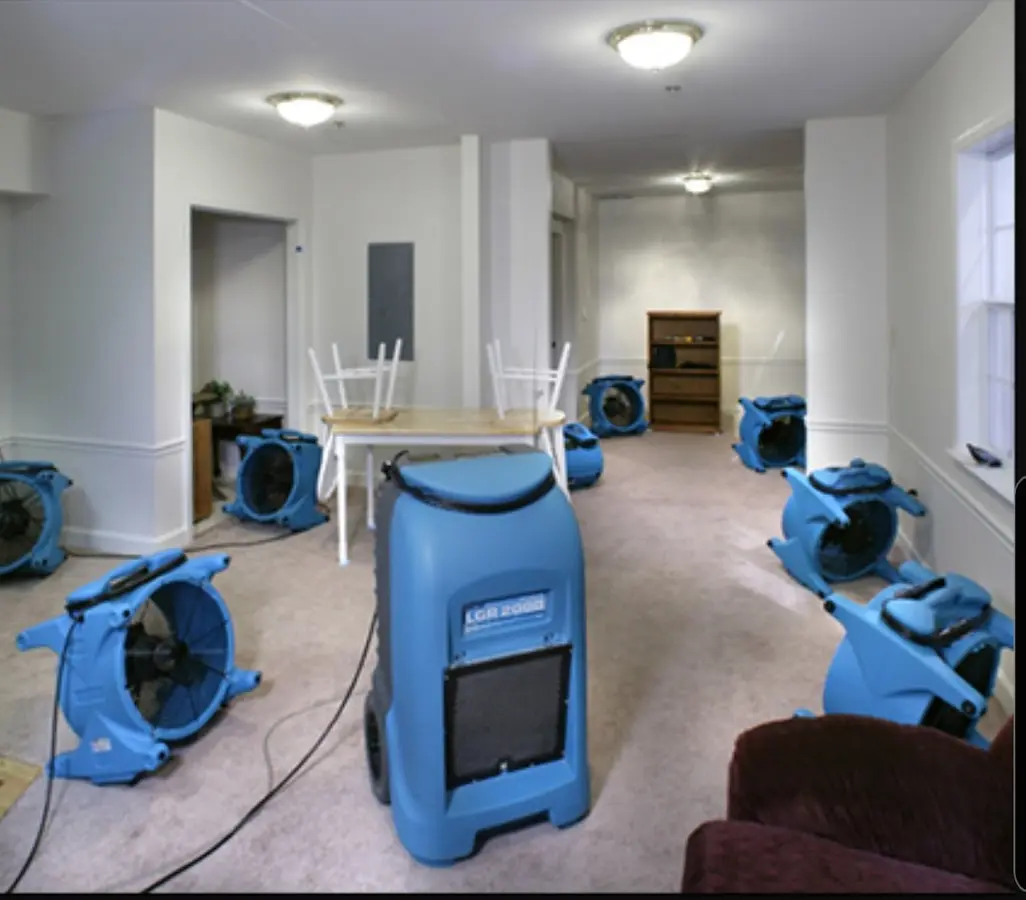Air movers and dehumidifier setup for Water Extraction & Removal in Parma
